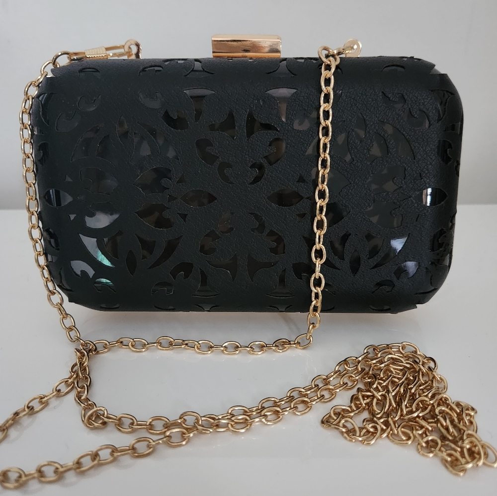 Black and gold evening clutch with chain